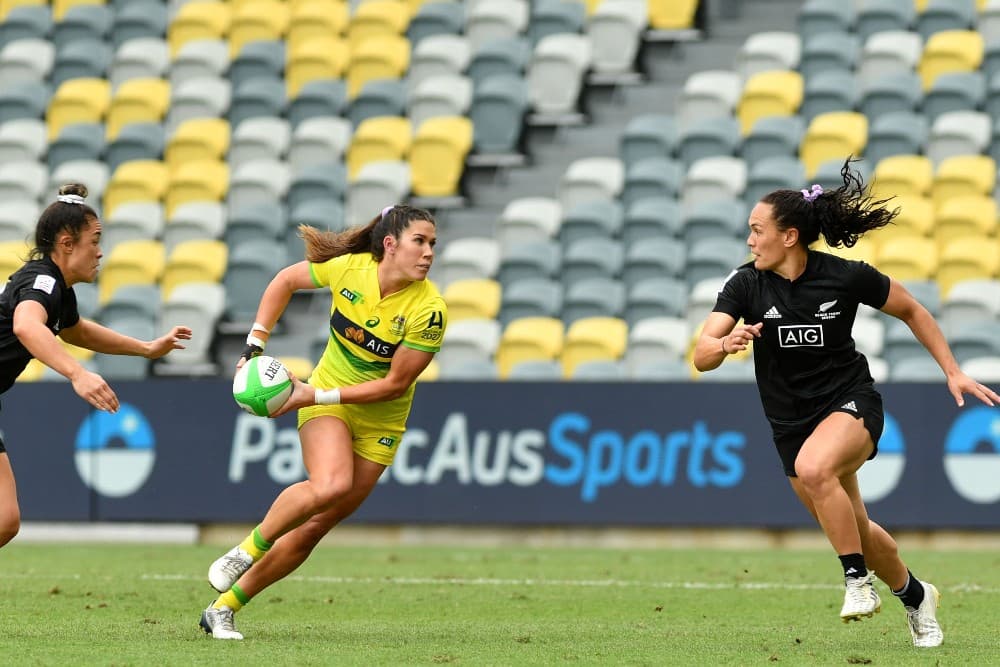 Charlotte Caslick takes on Portia Woodman during the 2021 PacificAus Sports Oceania Sevens