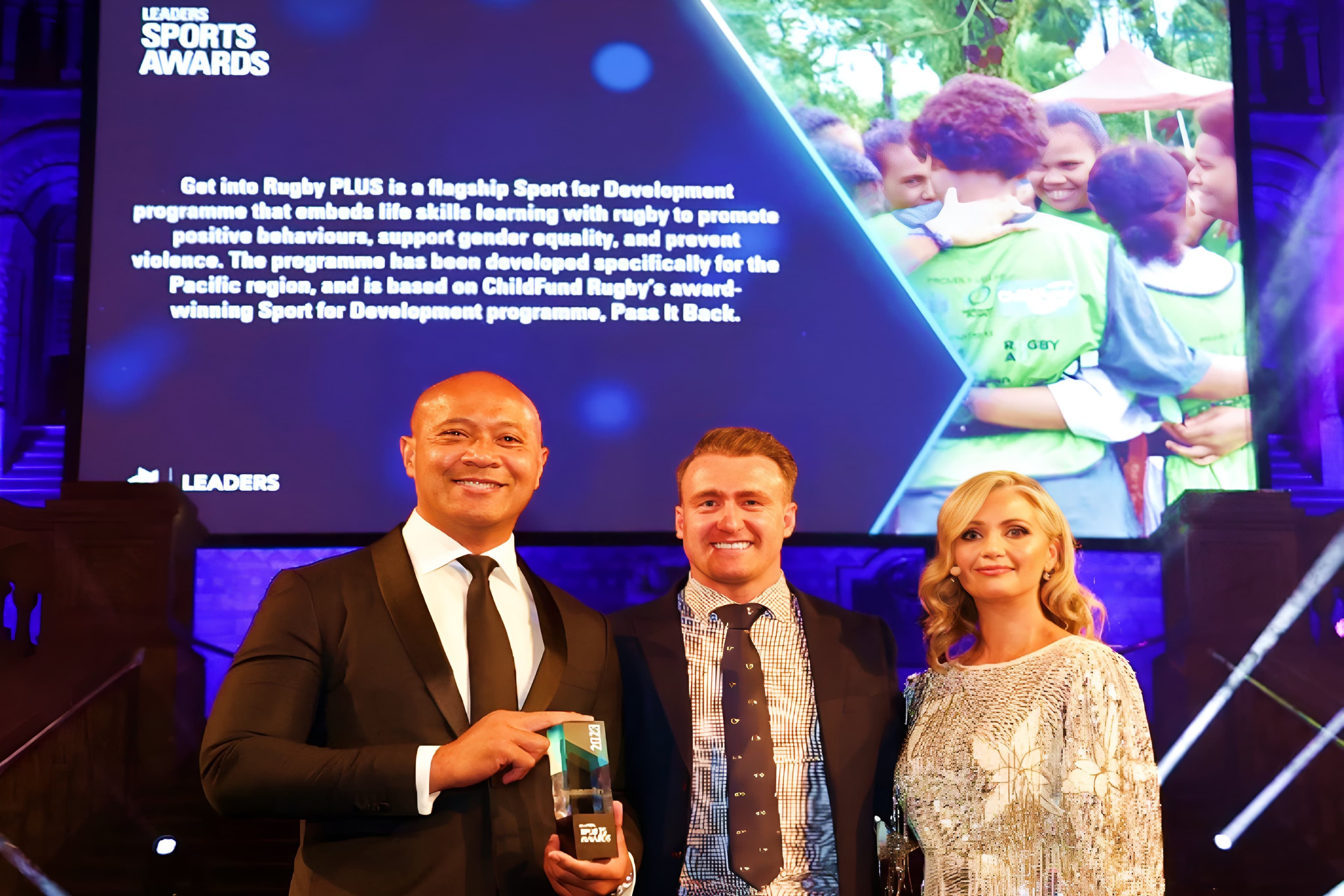 Oceania Rugby General Manager, Frank Puletua [far left] receiving the Community Award