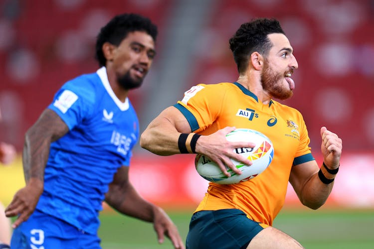 Matthew Gonzalez of Australia runs with the ball for a try against Samoa in their pool match during the HSBC Singapore Rugby Sevens at the National Stadium. Photo: Getty Images